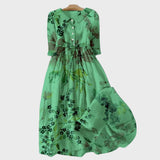 Grünes Kleid mit Schattierten Blumen