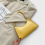 Emilia - Glänzende Tasche