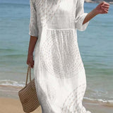 Weisses besticktes Kleid mit feinem Detail