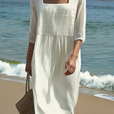 Weisses besticktes Kleid mit leichter Passform